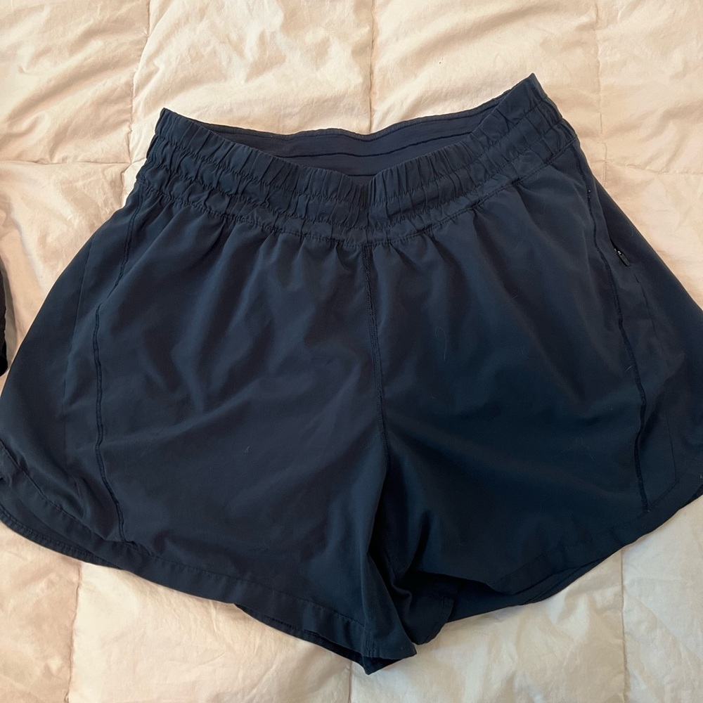 Navy blue lululemon track that short 5” inseam